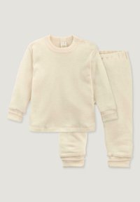 Cremfarbener Baumwoll-Loungewear-Set, bestehend aus einem Langarm-Oberteil mit Schulterdrukknöpfen und passenden Hosen mit gerippten Bündchen. Weicher Stoff.