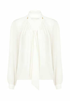 Blusa bianca a maniche lunghe con colletto alto, dettaglio annodato sul davanti, pieghe e accenti dorati sullo scollo. Tessuto liscio e vestibilità morbida.