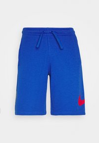 Blå atletiska shorts i mjukt material, med en röd Nike-logotyp på nedre högra sidan och justerbar dragsko i midjan.