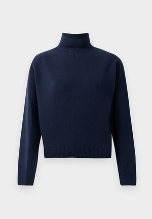 Suéter de cuello alto de manga larga en azul marino, con puños, dobladillo y cuello acanalados, presentado sobre un fondo blanco liso.