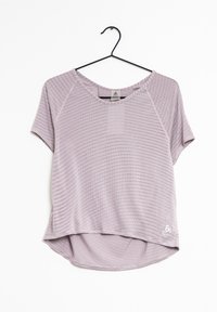 Ljuslila träningsskjorta med korta ärmar, texturerat mönster, rundad halsringning och hög-låg nederkant. Logotyp placerad längst ner till höger.