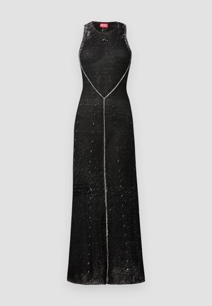 Robe sans manches noire en tissu texturé, avec un corsage ajusté et une jupe évasée. Des coutures blanches contrastantes courent verticalement sur le devant.