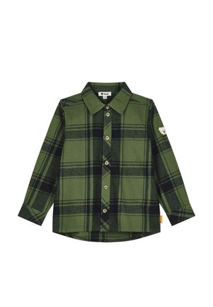 Green and black plaid long-sleeve button-up shirt with a collar and a small teddy bear patch on the left sleeve.