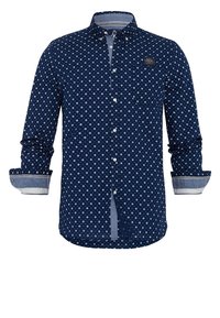 Tummansininen napillinen paita, jossa on valkoisia pieniä tähtiä ja pitkät hihat, joissa on kontrastivärit. Rinnassa logo. Valmistettu kankaasta.