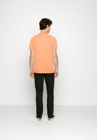 TOM TAILOR BASIC  - Polo - soft peach orange