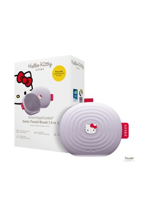 Brosse faciale sonique parfum lavande à thème Hello Kitty, avec surface rainurée, présentée à côté de sa boîte blanche contenant les détails du produit.