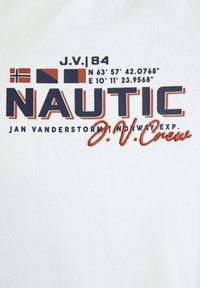 White fabric featuring a graphic print with blue and orange text reading "NAUTIC" and "JAN VANDERSTORM," along with coordinates and small flags.