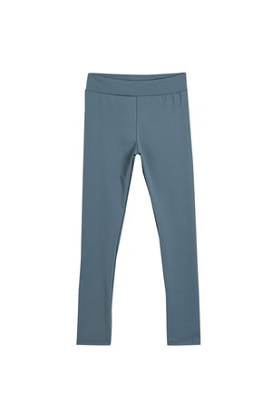 Leggings azules hechos de una tela suave y elástica. Presentan una cinturilla ancha y un diseño ajustado, sin patrones o herrajes visibles.