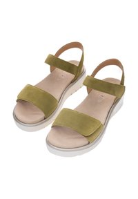 Green suede sandals featuring two wide straps, a cushioned footbed, and a thick white sole. The design offers an open-toe style.