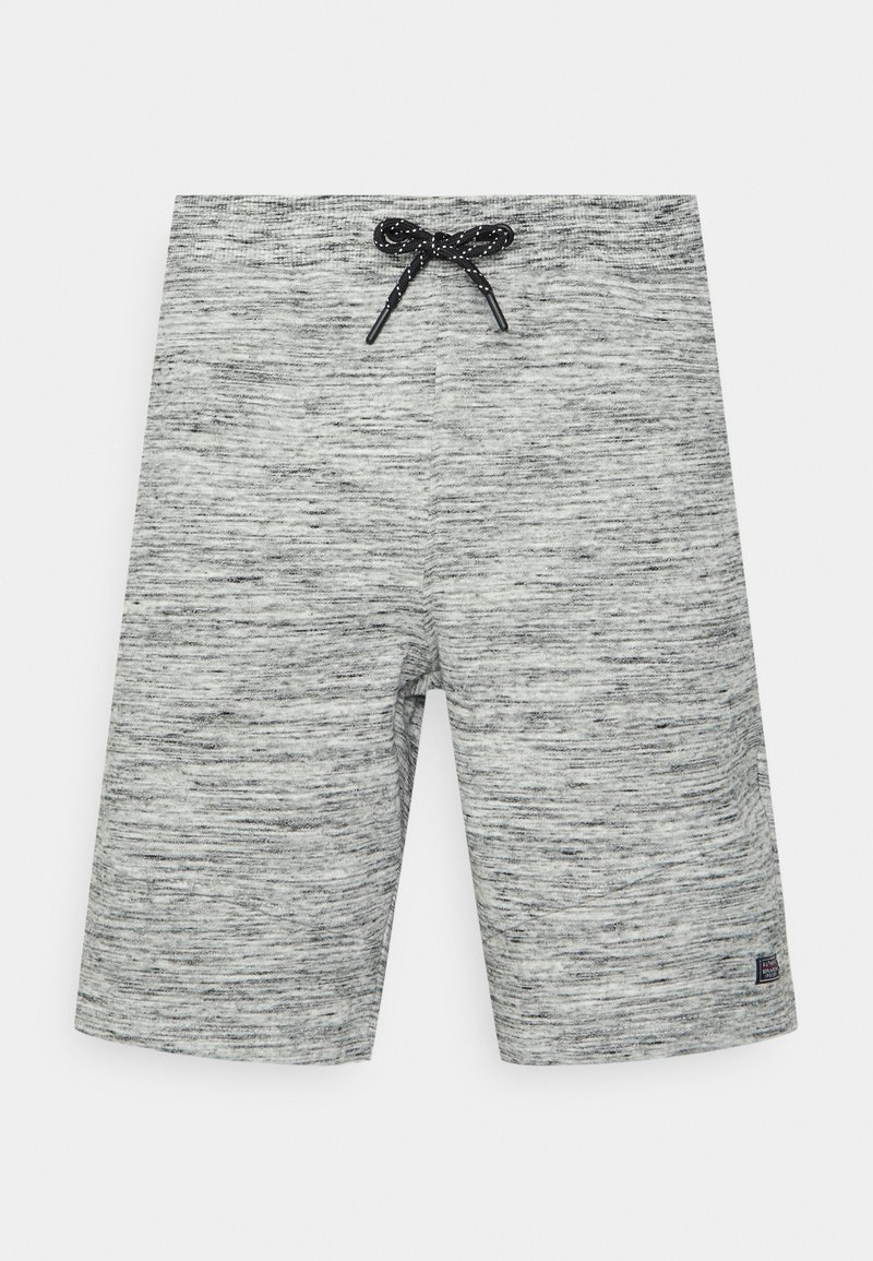 Shorts de sport gris en tissu texturé et mélangé. Équipés d'une taille élastique avec un cordon noir et d'un petit logo dans le bas.