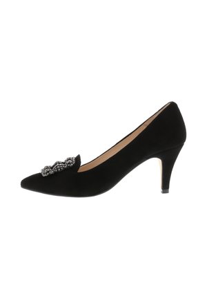 Black suede pointed-toe mid-heel pump with a silver decorative buckle on the front and a beige interior lining.