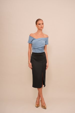 Light blue off-shoulder top with gathered texture, paired with a black pencil skirt featuring a side slit. Sparkly gold high heels.