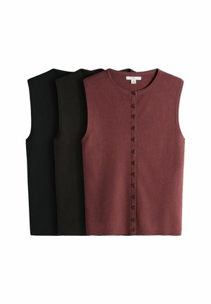 Trois hauts sans manches à boutons côtelés en noir, olive foncé et mauve, disposés en chevauchement sur fond blanc.