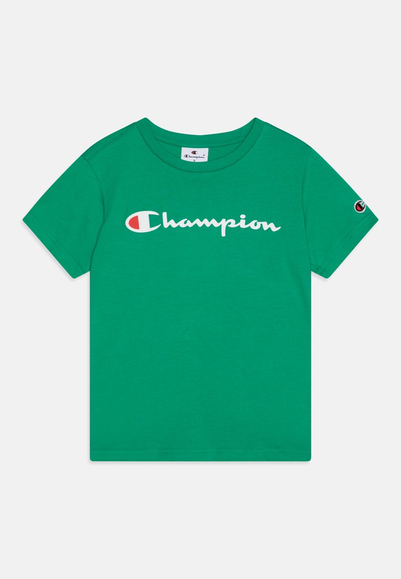 Zelené bavlnené tričko s bielym kurzívnym logom "Champion". Kulatý výstrih a krátke rukávy s emblémom na ľavom rukáve.