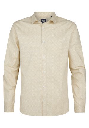 Camisa de manga larga amarilla clara con un patrón geométrico, cuello abotonado y botones blancos. Tejido suave y corte entallado.