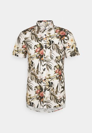 Chemise à manches courtes arborant un motif floral tropical en vert, rose et beige, avec un col boutonné et une poche sur la poitrine gauche.