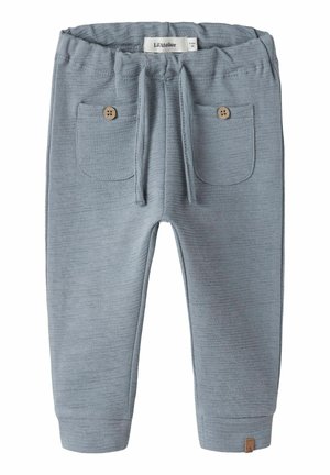 Jasnoniebieskie spodnie dla małych dzieci z elastycznym pasem, sznurkami z przodu, dwoma kieszeniami na guziki oraz ściągaczami przy nogawkach.