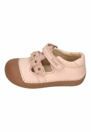 Light pink toddler shoe with brown rubber toe and sole, featuring floral cutouts and a hook-and-loop strap closure.