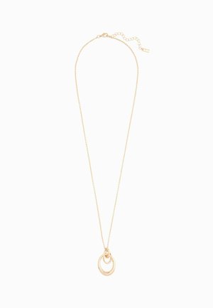 Guld halskæde med en tynd kæde og to sammenflettede, cirkulære vedhæng. Vedhængene har en glat, reflekterende overflade og et minimalistisk design.