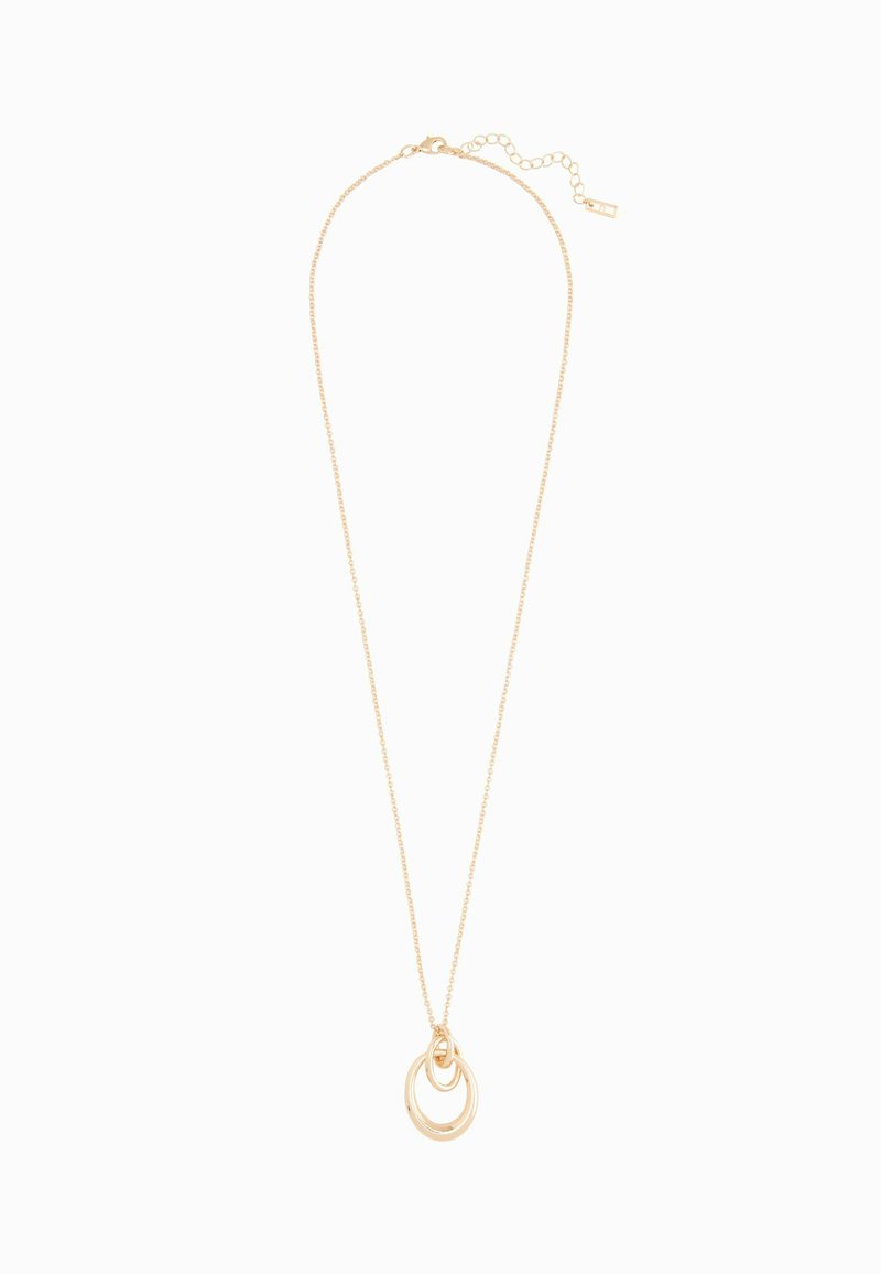 Guld halskæde med en tynd kæde og to sammenflettede, cirkulære vedhæng. Vedhængene har en glat, reflekterende overflade og et minimalistisk design.