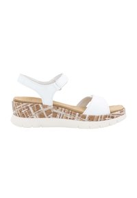 White sandal with adjustable strap, cork-like textured wedge heel, and smooth footbed. Features a patterned design on the wedge.