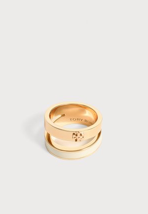 Δαχτυλίδι διπλής ζώνης σε χρυσό τόνο Tory Burch με μικρό έμβλημα λογότυπου στη πάνω ζώνη και λείο, γυαλιστερό φινίρισμα.