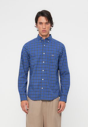 Blue and white checked long-sleeve shirt with a button-down collar and front placket, made of light fabric with a smooth texture.