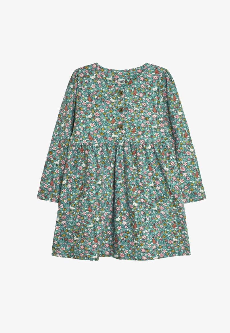 Sukienka z długim rękawem w kolorze turkusowym z kwiatowym wzorem. Posiada drewniane guziki oraz marszczenie w pasie. Zawiera dwie boczne kieszenie.