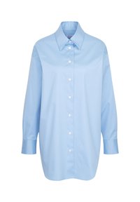 Camicia a maniche lunghe blu chiaro in tessuto leggero. Caratterizzata da colletto a punta, chiusura con bottoni e silhouette rilassata.