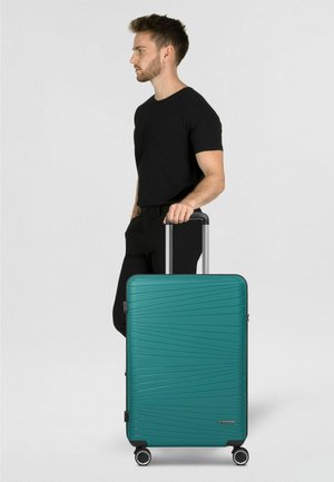 FRANKY, DALLAS 3.0 4 ROLLEN TROLLEY M 65 CM MIT DEHNFALTE UNISEX - Valise à roulettes - turquoise