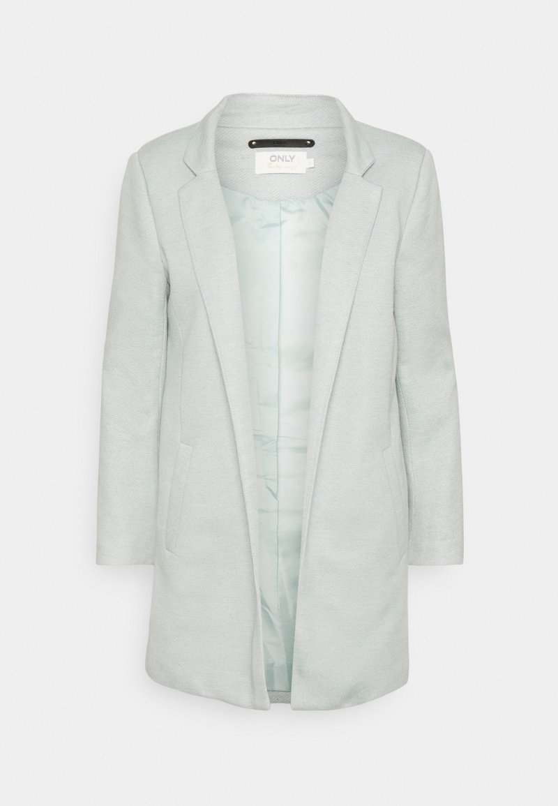 Ljusgrå, midjelång kappa med slagkrage, två sidofickor och ett slätt innerfoder. Har en subtil struktur och en enkel design.