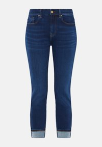 Jeans in denim blu scuro con una vestibilità slim, design a cinque tasche e orli arrotolati con accenti di blu più chiaro. Chiusura classica con bottone dorato.