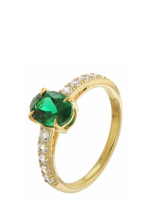 Gold ring with a large oval green gemstone in the center and small clear stones set along both sides of the band.
