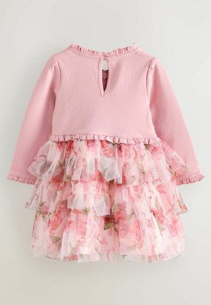 Rosa langärmeliges Kleid mit einem einfarbigen Oberteil und einem geschichteten, gerafften Tüllrock mit Blumenmuster. Schlüsselaugenverschluss hinten mit Knopfdetail.