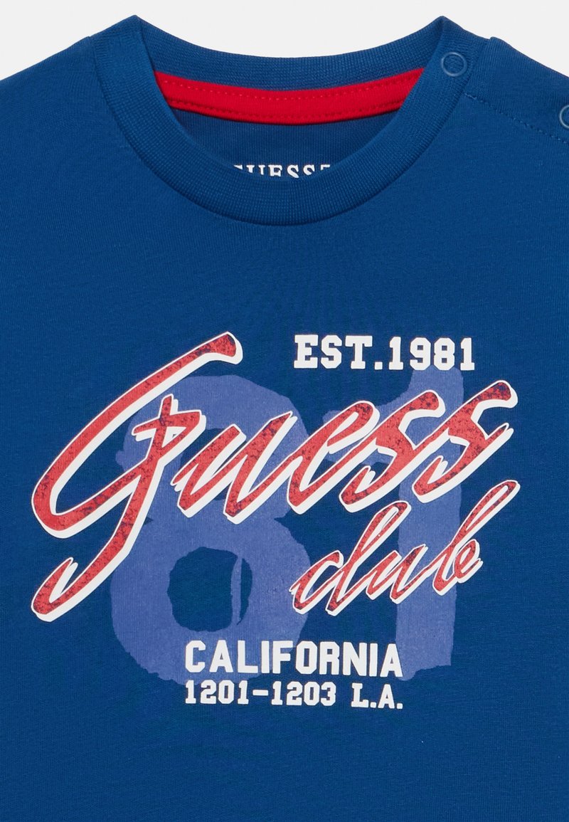 Guess T-shirt Bébé Garçon - Manches Courtes - Boutonnage Devant - Coton Doux - Pour Nourrisson Et Jeune Enfant