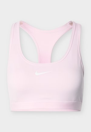 Svetlo roza športni nedrček z gladko teksturo, širokimi naramnicami in dizajnom z vzvratnim križem. Na sprednji strani bel Nike logotip.