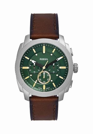 Men’s Fossil wristwatch with green dial, silver bezel, three subdials, and brown leather strap showing 10:10:35 time.