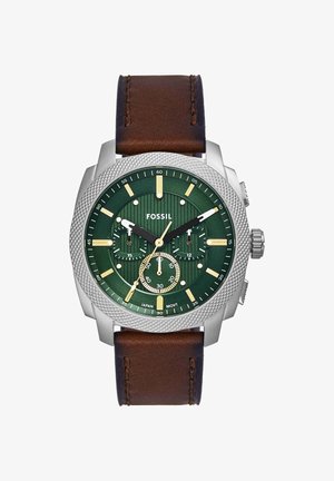 Men’s Fossil wristwatch with green dial, silver bezel, three subdials, and brown leather strap showing 10:10:35 time.
