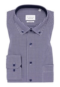 Camicia a quadri bianca e navy con vestibilità moderna, colletto button-down e polsini a doppio bottone. Tessuto morbido e cuciture dettagliate.