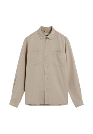 Beige long-sleeve shirt with a collar, two front pockets, and button closure. Made of smooth fabric with minimal texture.
