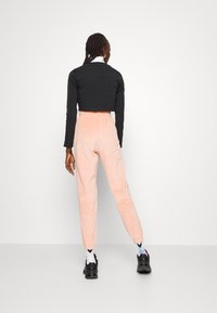 adidas Originals JOGGER - Treningo apatinė dalis - ambient blush