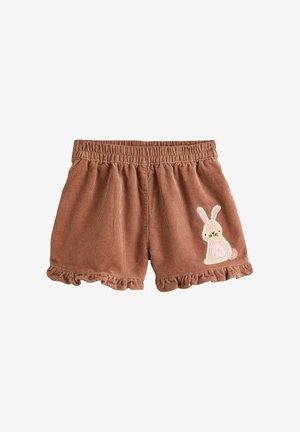 Brązowe szorty z kordurojowego materiału dla malucha, z elastyczną talią, falbanastymi brzegami i różową łatą w kształcie królika na prawej nogawce.