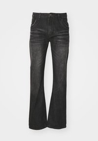 Svarta utsvängda denimjeans med en subtil bländande struktur, utrustade med fem fickor, knappstängning fram och sydda detaljer längs sömmarna.