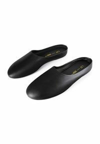 Black slip-on shoes with a smooth leather exterior, rounded toe, and seamless design, featuring a cushioned insole for comfort.