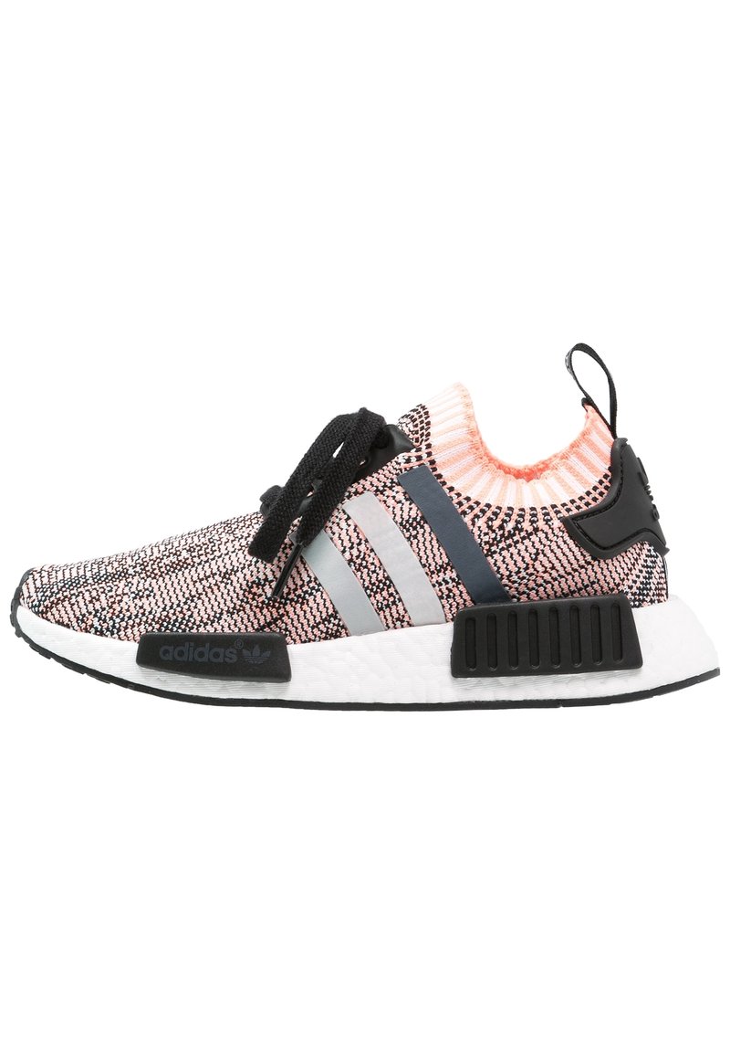 Athletic sneaker with pink and black knit upper, black laces, white sole, black accents, and three reflective Adidas stripes on the side.