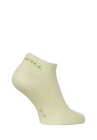 Lichtgroene enkelkous gemaakt van zachte stof, met een geribde manchet en een gedrukte maatindicatie op de zool. Gladde textuur zonder patronen.