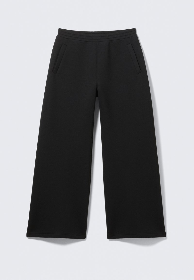 Black wide-leg pants with elastic waistband and two front slit pockets on a plain light background.