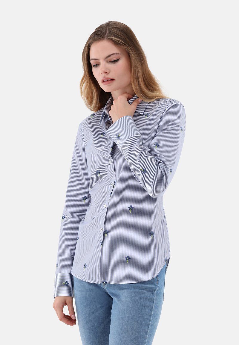 Button-up shirt in blue and white stripes, featuring small floral embroidery. Cotton fabric, long sleeves, standard collar, and tailored fit.