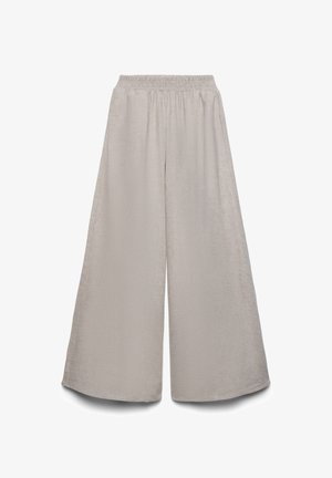 Pantaloni larghi grigio chiaro con vita elasticizzata e vestibilità ampia, mostrati su sfondo bianco.
