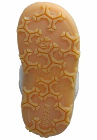 Gummisohle in einem hellen Orangeton, mit einem Schneeflockenmuster und einem kleinen Logo in der Mitte. Durchsichtige Griffigkeit.